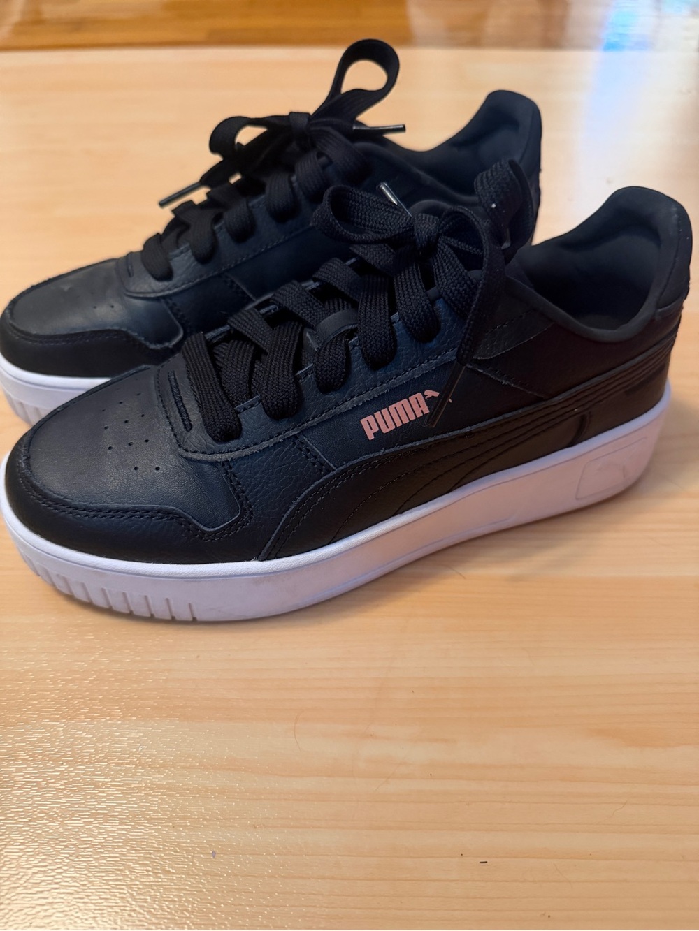 Puma Black Low-Top Sneakers with Pink Logo and White Sole